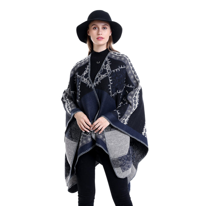 Women's Oversize Ruana Poncho made of jacquard fabric with asymmetrical pointed edge and ornamental border Mune Fashion