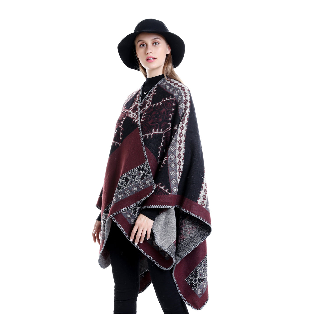 Women's Oversize Ruana Poncho made of jacquard fabric with asymmetrical pointed edge and ornamental border Mune Fashion