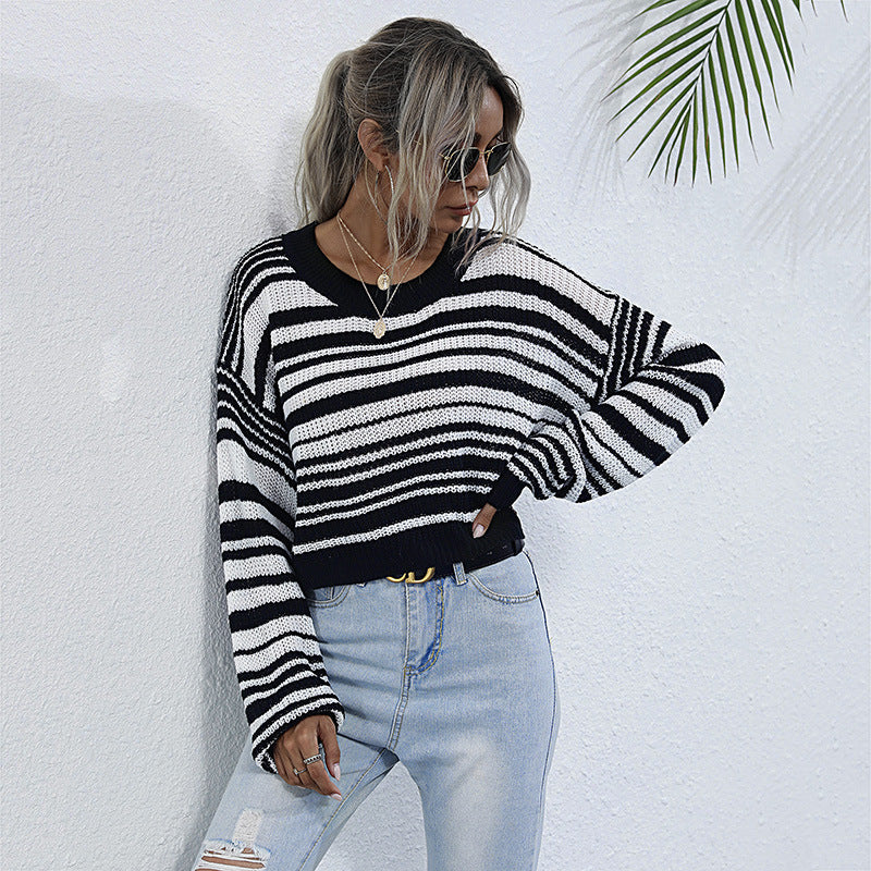 Women’s oversized striped cropped knit sweater with asymmetric off-the-shoulder neckline Mune Fashion