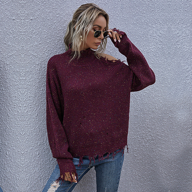 Women chunky knit sweater with high collar, asymmetrical shoulder cut-out and frayed hem Mune Fashion