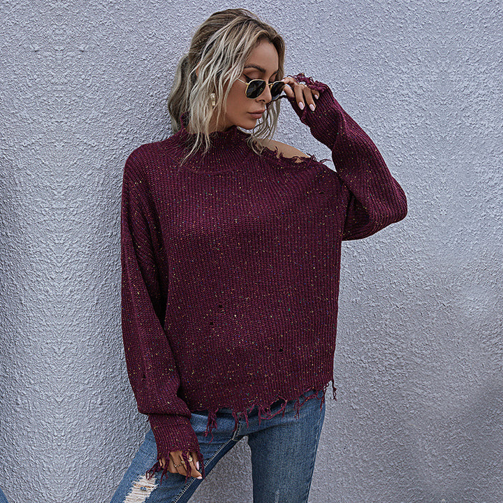 Women chunky knit sweater with high collar, asymmetrical shoulder cut-out and frayed hem Mune Fashion