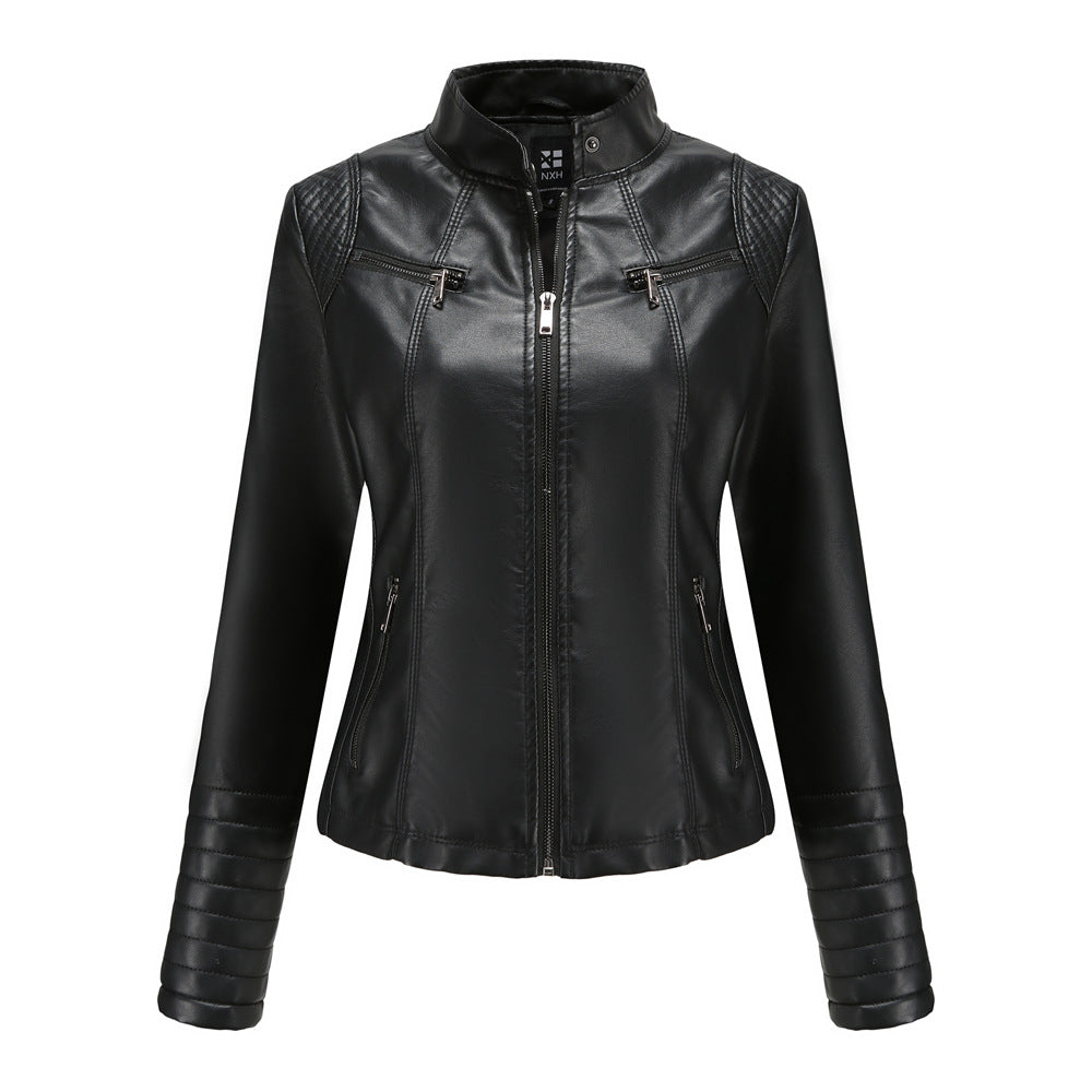 Women's fitted biker jacket made of faux leather with stand-up collar and quilted sleeve section Mune Fashion