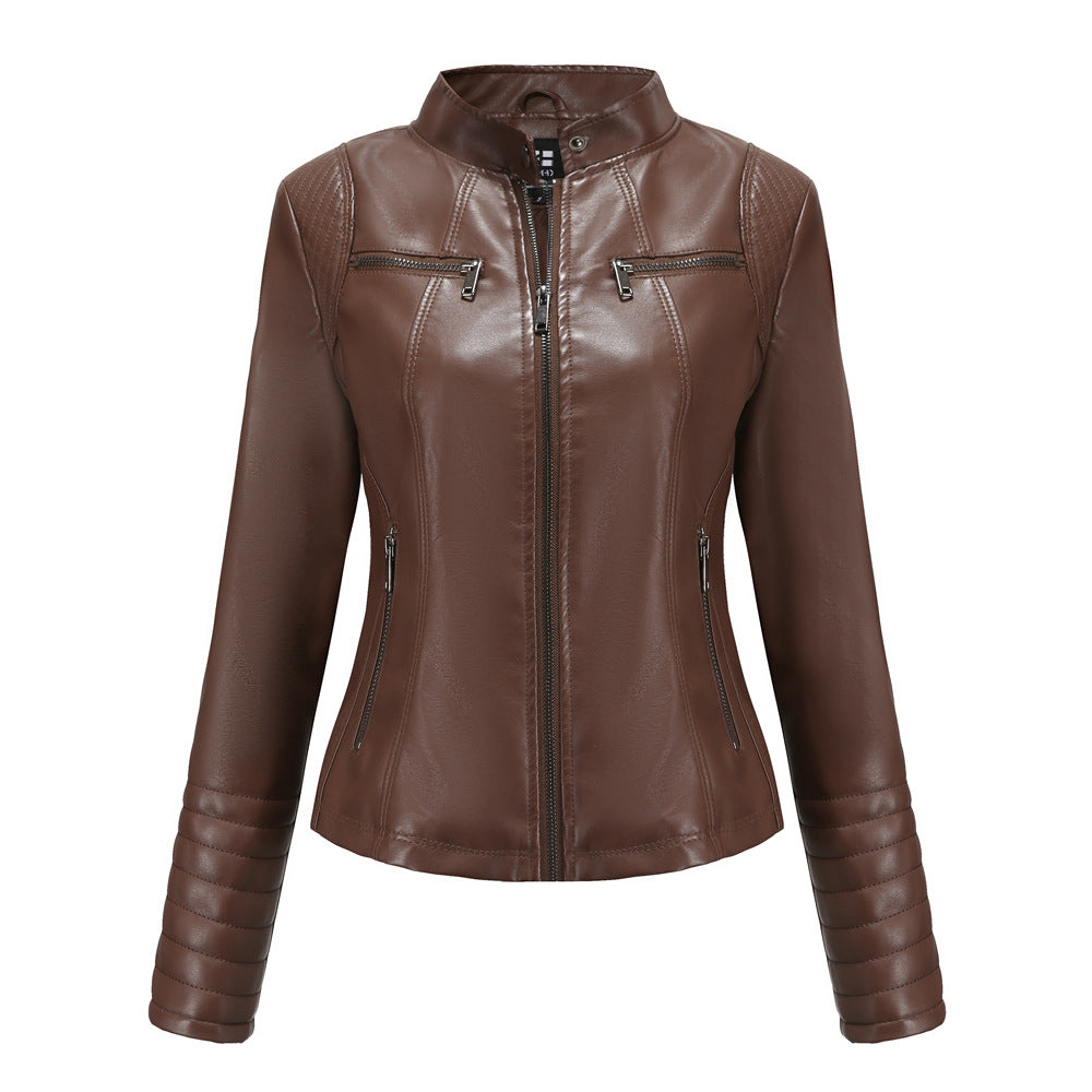 Women's fitted biker jacket made of faux leather with stand-up collar and quilted sleeve section Mune Fashion