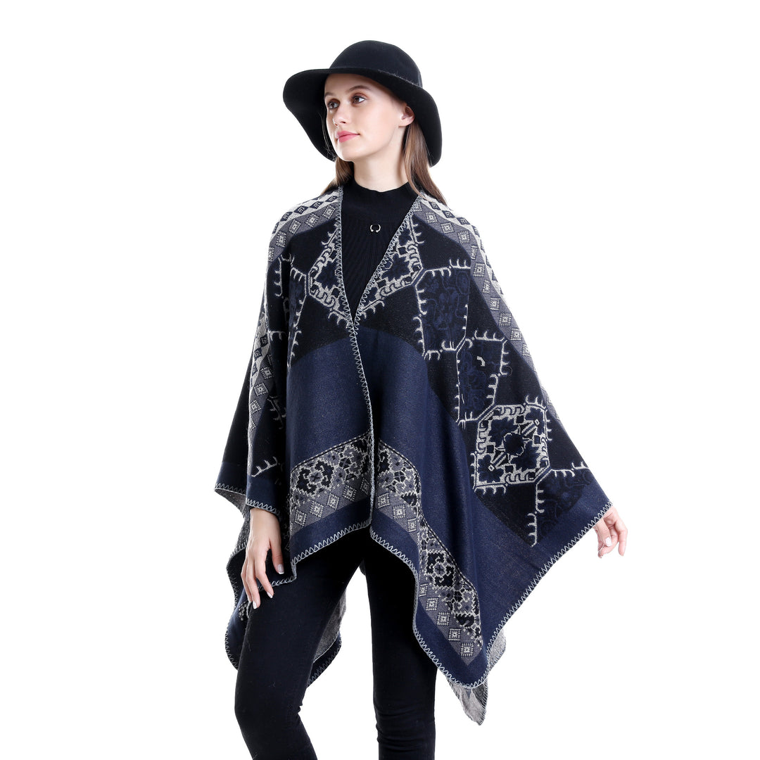 Women's Oversize Ruana Poncho made of jacquard fabric with asymmetrical pointed edge and ornamental border Mune Fashion