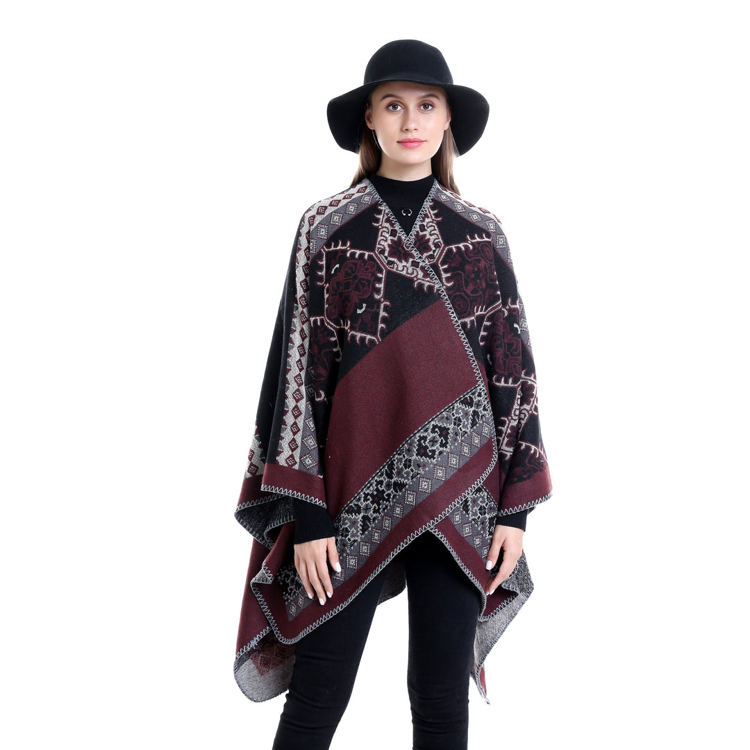 Women's Oversize Ruana Poncho made of jacquard fabric with asymmetrical pointed edge and ornamental border Mune Fashion