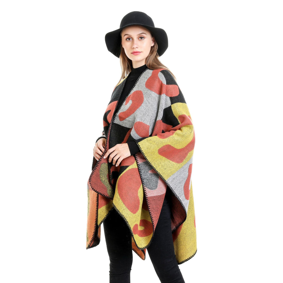 Women's Oversized Ruana with abstract graphic jacquard and decorative overlock seam Mune Fashion