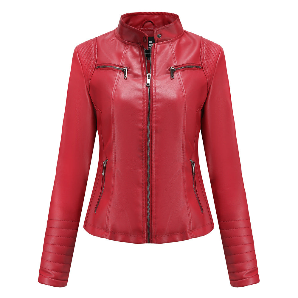 Women's fitted biker jacket made of faux leather with stand-up collar and quilted sleeve section Mune Fashion