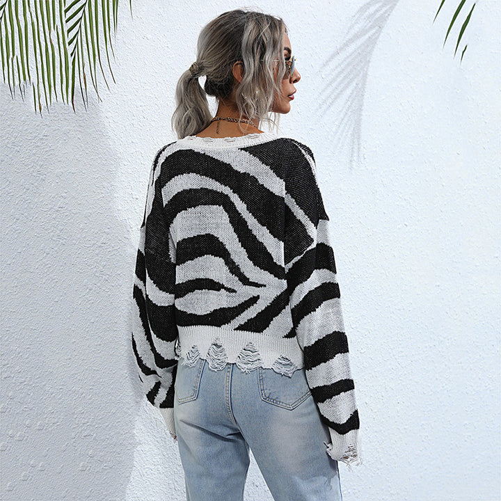 Women's Oversized V-Neck Sweater with Zebra Pattern and Frayed Hem