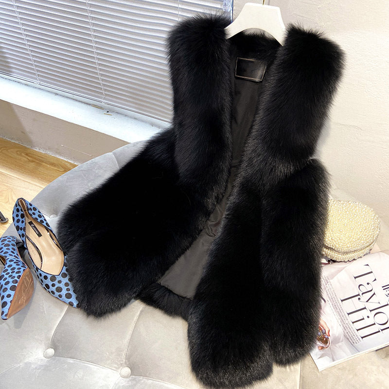 Ladies faux fur vest with long pile fur, waist-length A-line and padded inner finish Mune Fashion