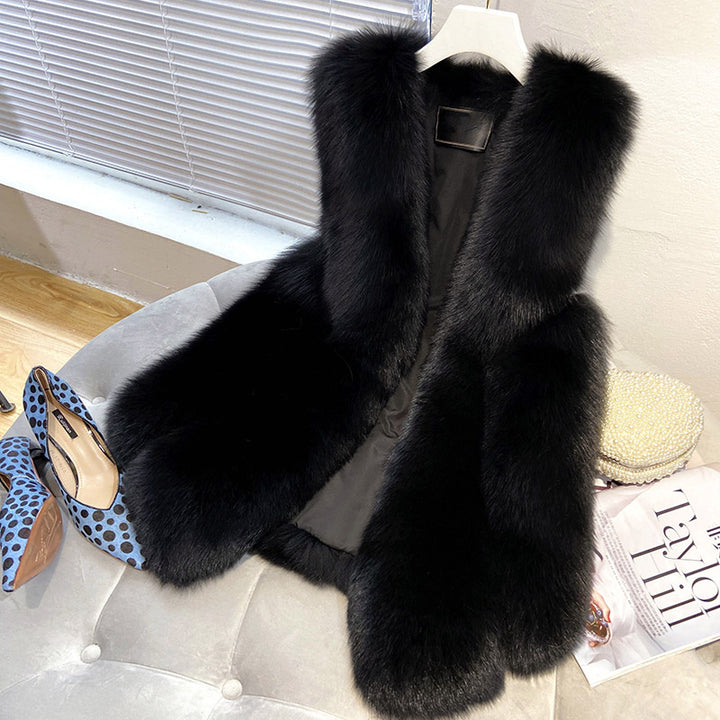 Ladies faux fur vest with long pile fur, waist-length A-line and padded inner finish Mune Fashion
