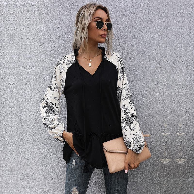 Women's viscose long blouse with V-neck, ruffled waist and contrasting raglan sleeves Mune Fashion