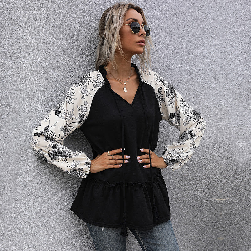 Women's viscose long blouse with V-neck, ruffled waist and contrasting raglan sleeves Mune Fashion