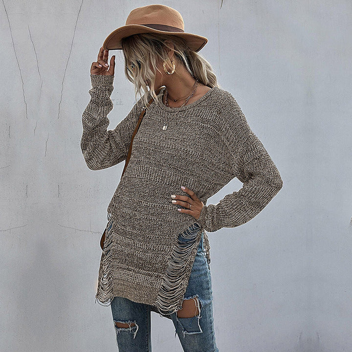 Women's chunky knit long sweater with side fringes and ribbed hem Mune Fashion