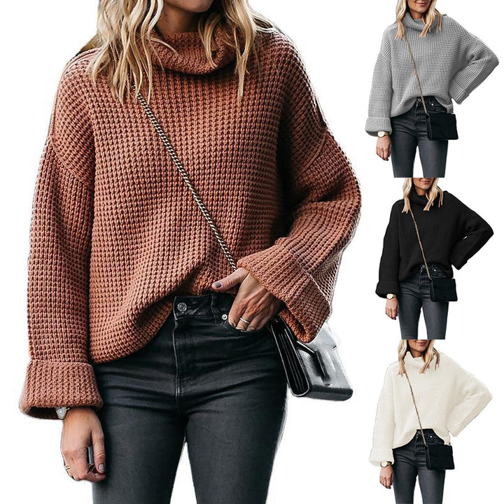 Ladies chunky knit turtleneck sweater with wide oversized cut and folded sleeves Mune Fashion