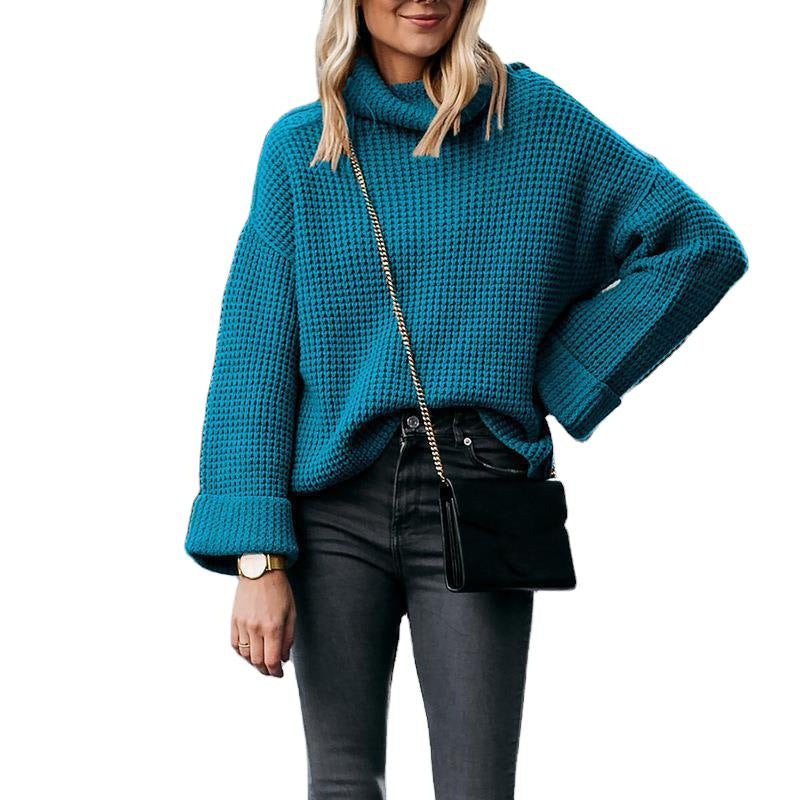 Ladies chunky knit turtleneck sweater with wide oversized cut and folded sleeves Mune Fashion