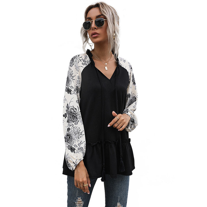 Women's viscose long blouse with V-neck, ruffled waist and contrasting raglan sleeves Mune Fashion