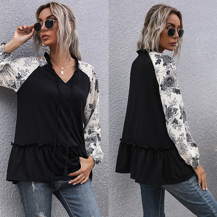 Women's viscose long blouse with V-neck, ruffled waist and contrasting raglan sleeves Mune Fashion