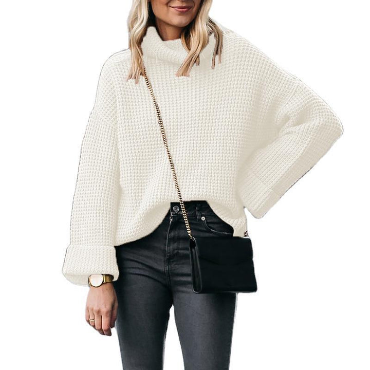 Ladies chunky knit turtleneck sweater with wide oversized cut and folded sleeves Mune Fashion