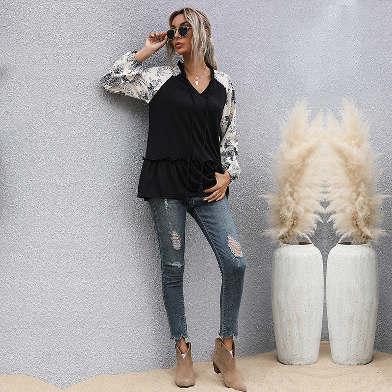 Women's viscose long blouse with V-neck, ruffled waist and contrasting raglan sleeves Mune Fashion