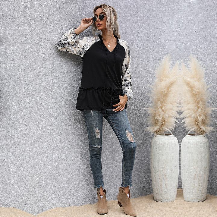 Women's viscose long blouse with V-neck, ruffled waist and contrasting raglan sleeves Mune Fashion