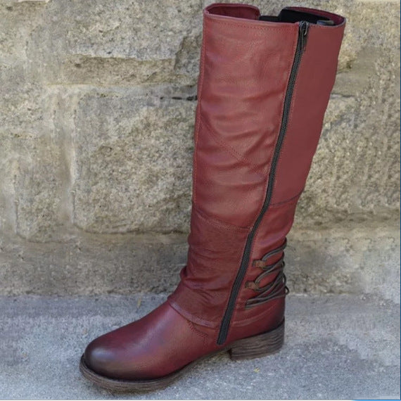 Women's knee-high boots in leather look with adjustable decorative straps and profile rubber sole Mune Fashion