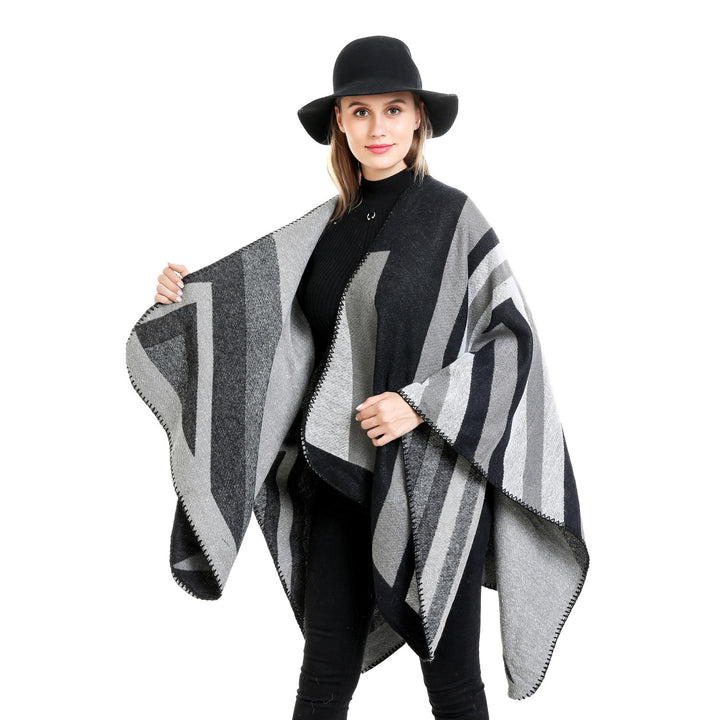 Women's Oversize Ruana with graphic block pattern and decorative overlock seam Mune Fashion