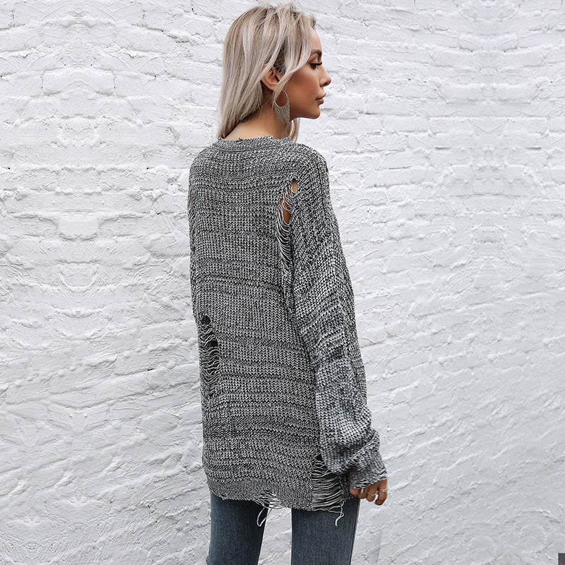 Women's oversized knit sweater with chunky textured knit, asymmetrical hem and used look Mune Fashion