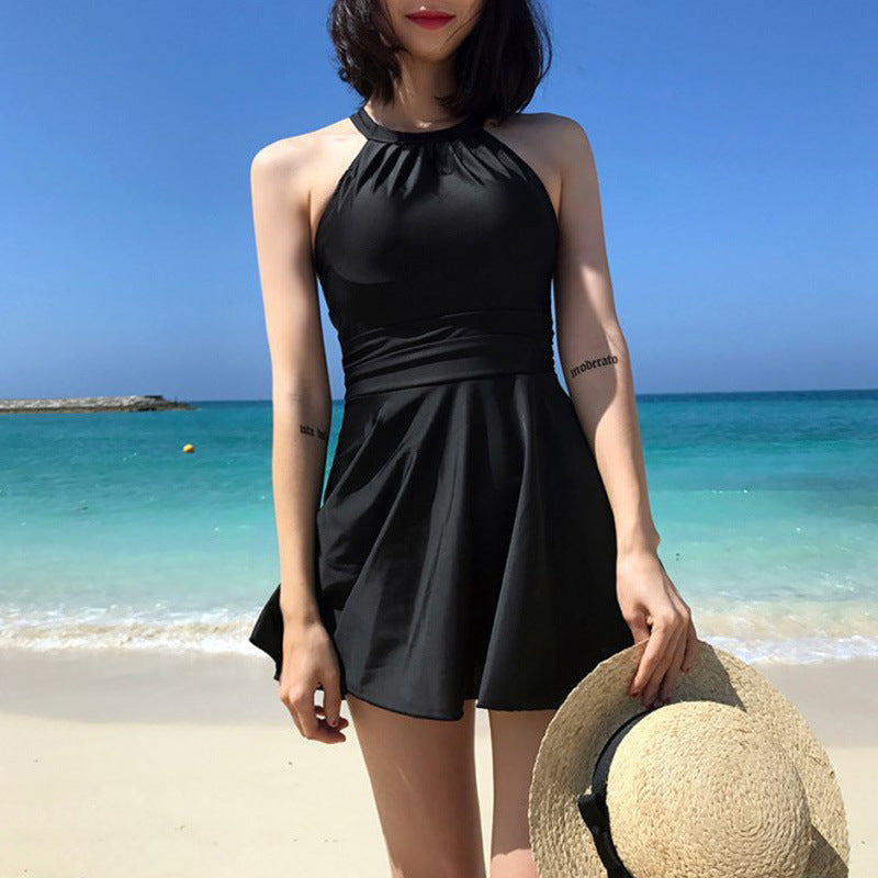 Women's swimsuit with fashionable back cut and playful skirt Mune Fashion
