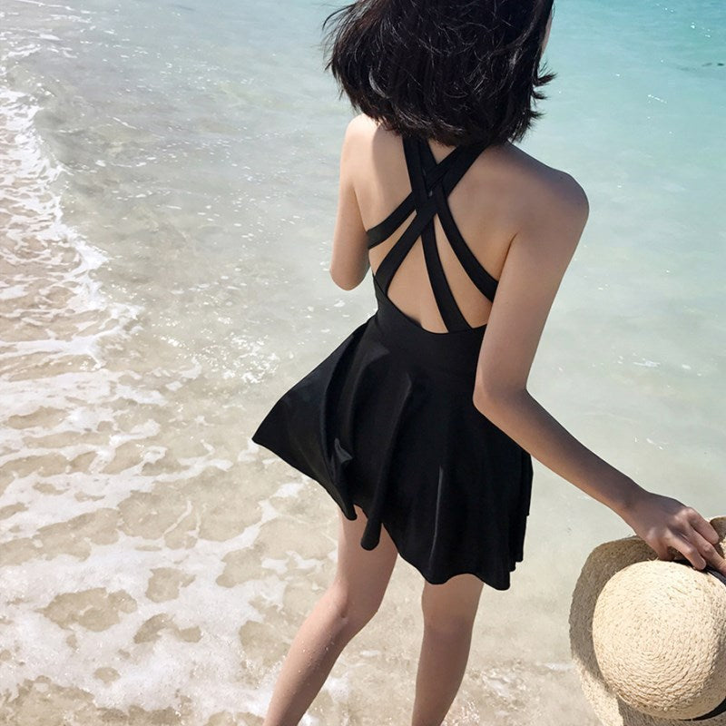 Women's swimsuit with fashionable back cut and playful skirt Mune Fashion