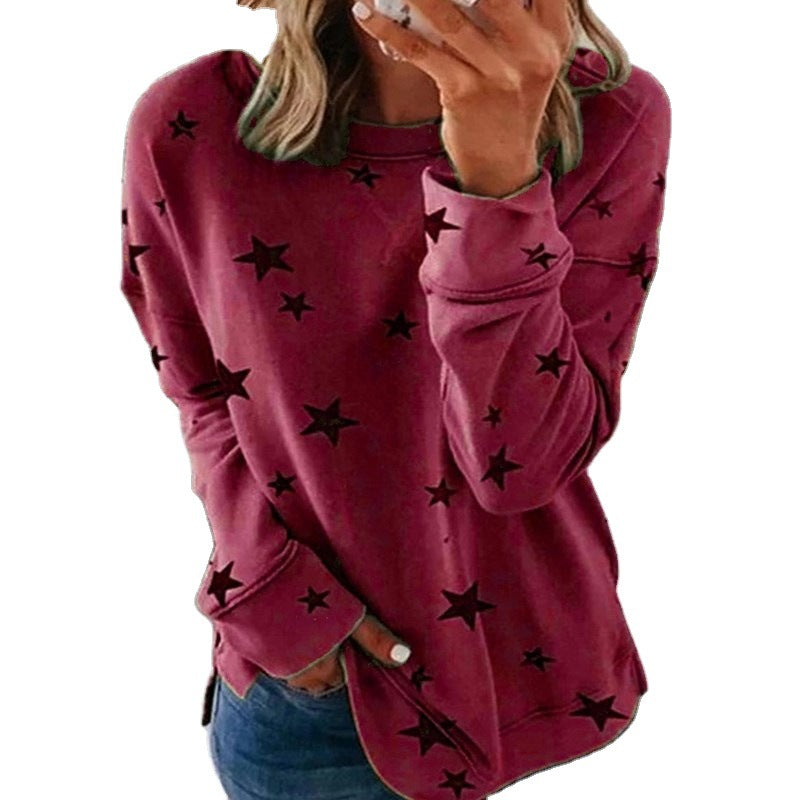 Ladies oversized star print sweatshirt with round neck, extended back and side slits Mune Fashion