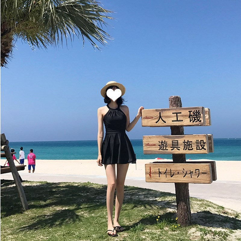 Women's swimsuit with fashionable back cut and playful skirt Mune Fashion