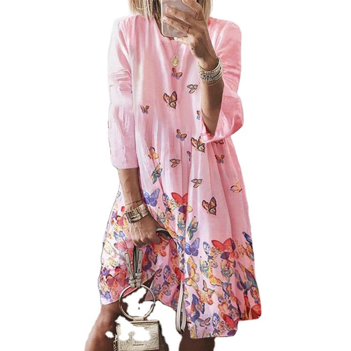 Women's airy midi dress with palm print, half-length sleeves and A-line cut Mune Fashion