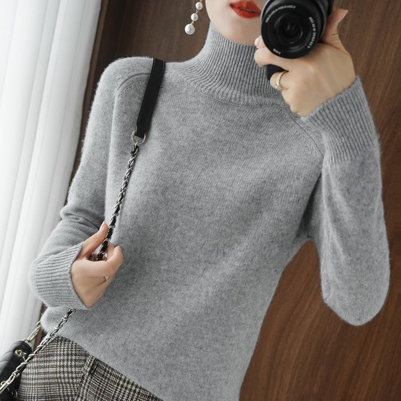 Women's turtleneck sweater made of cashmere blend with fine ribbed texture and dropped shoulder Mune Fashion