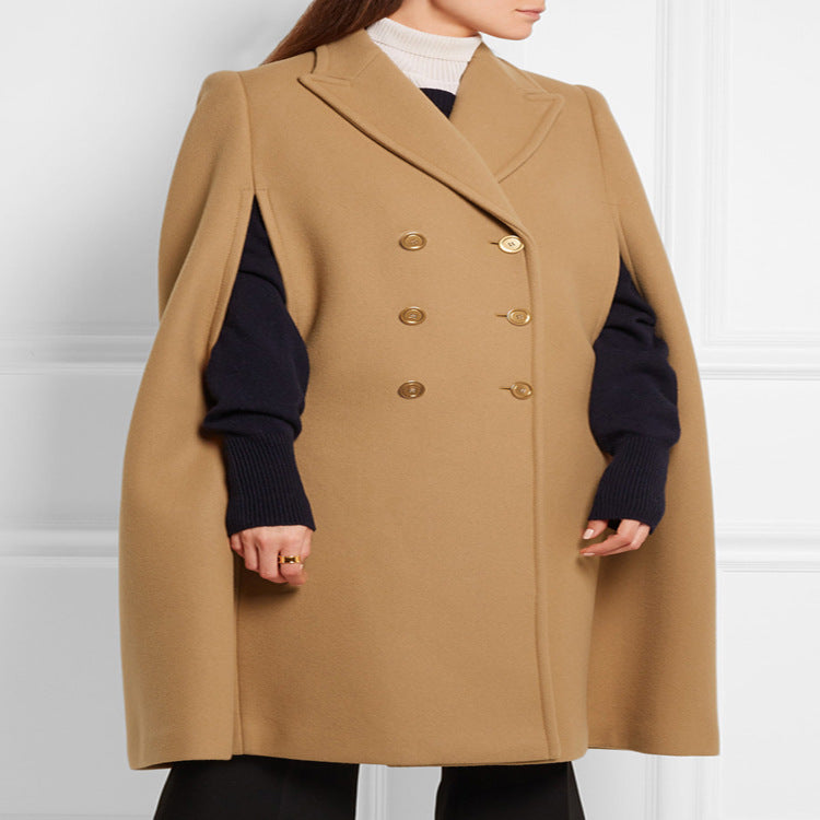 Women's tailored wool blend cape coat with concealed arm openings and double-breasted tailoring Mune Fashion