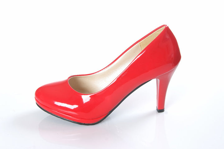 Ladies' elegant bridal pumps with rounded toe cap, padded comfort footbed, and sleek cone heel Mune Fashion