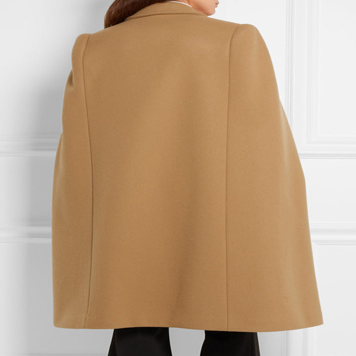 Women's tailored wool blend cape coat with concealed arm openings and double-breasted tailoring Mune Fashion