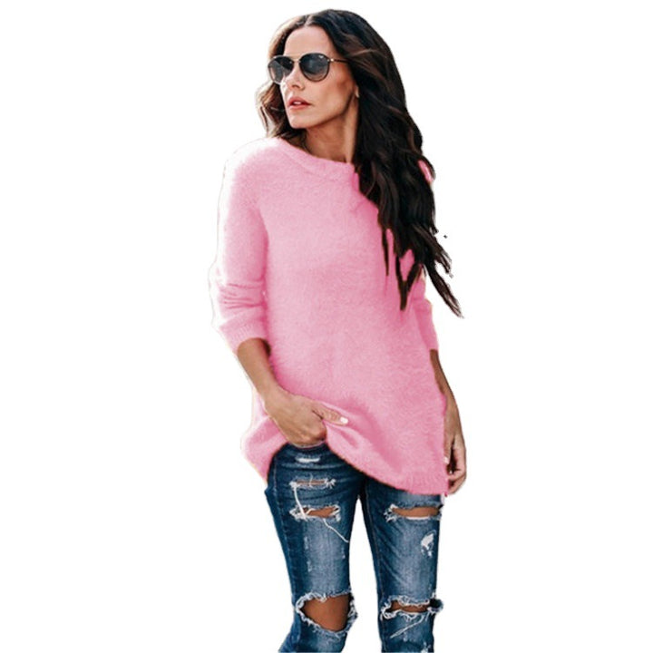 Women's cozy oversized knit sweater with round neckline, high-low hem, and side slits Mune Fashion