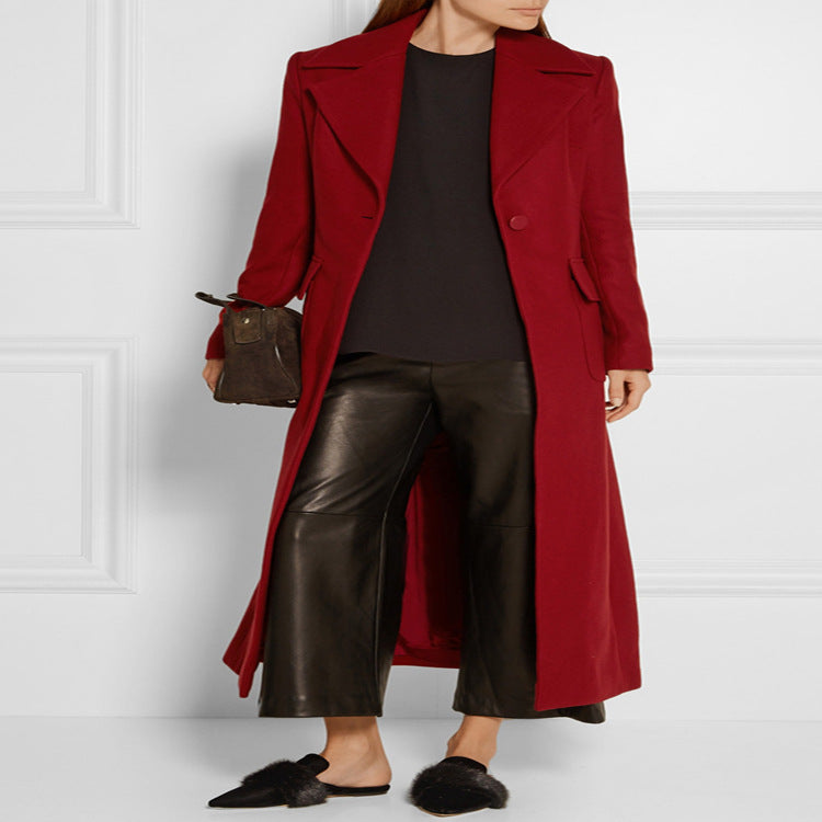 Women's maxi-length wool blend coat with tailored seam design, knife pleats, and flap pockets Mune Fashion
