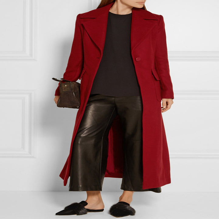 Women's maxi-length wool blend coat with tailored seam design, knife pleats, and flap pockets Mune Fashion