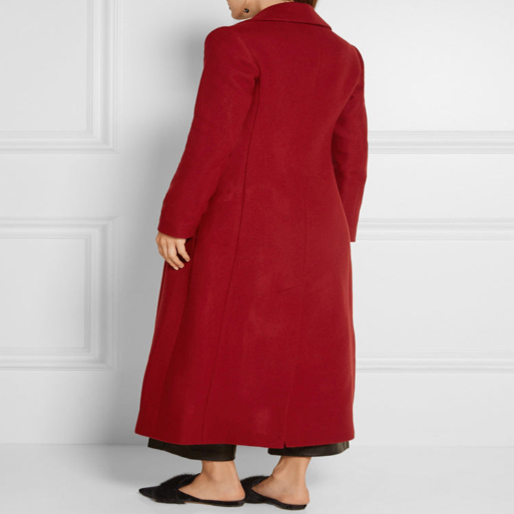 Women's maxi-length wool blend coat with tailored seam design, knife pleats, and flap pockets Mune Fashion