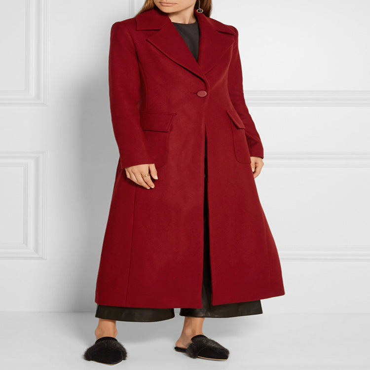 Women's maxi-length wool blend coat with tailored seam design, knife pleats, and flap pockets Mune Fashion