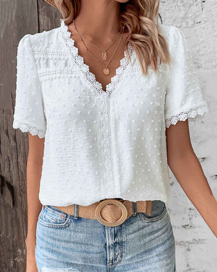 Ladies short-sleeve blouse with V neck and ruffled sleeves