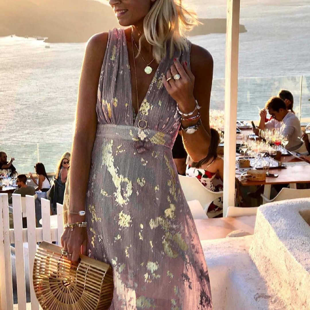 Flowing dress with V-neck and sequin embellishment