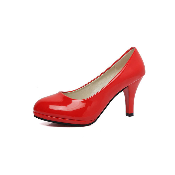 Ladies' elegant bridal pumps with rounded toe cap, padded comfort footbed, and sleek cone heel Mune Fashion