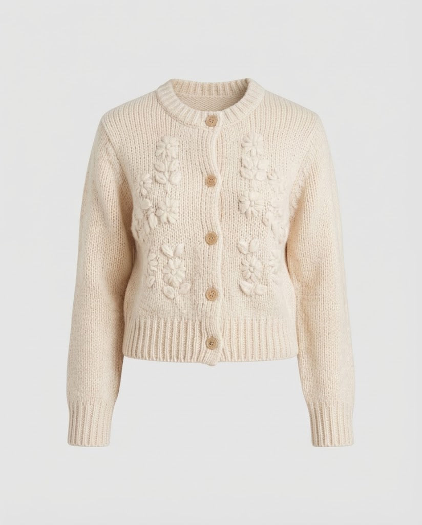 Women's chunky knit cardigan with bobble details, round neckline, and mother-of-pearl button placket Mune Fashion