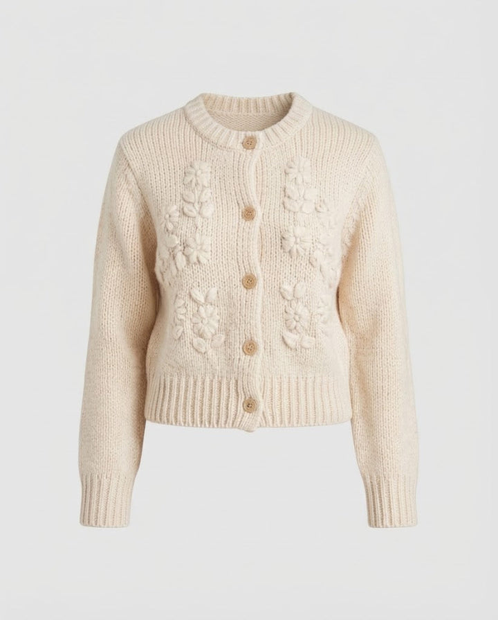 Women's chunky knit cardigan with bobble details, round neckline, and mother-of-pearl button placket Mune Fashion