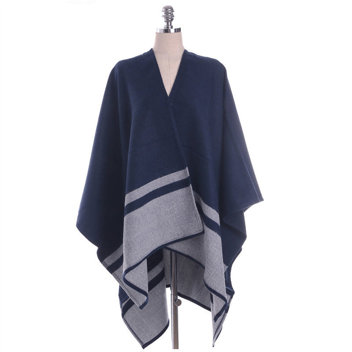 Women's oversized ruana in boxy cape cut with contrasting border outside