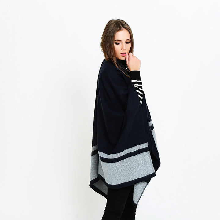 Women's oversized ruana in boxy cape cut with contrasting border outside