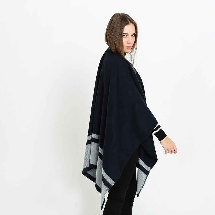Women's oversized ruana in boxy cape cut with contrasting border outside
