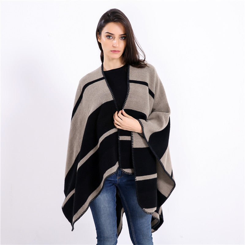 Women Oversize Ruana with geometric block stripes and decorative seams Mune Fashion